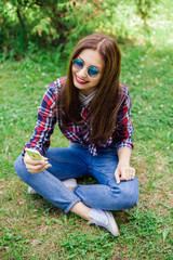 Fototapeta premium beautiful stylish women making selfie in park. Copy-space