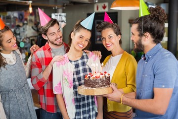 Friends celebrating woman birthday in restaurant