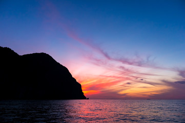 Naklejka na ściany i meble twilight sky and silhouette island