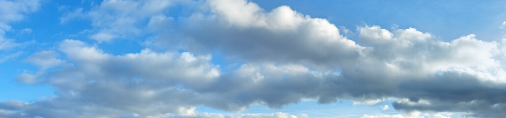 Blue sky background with clouds