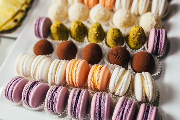 A french sweet delicacy, macaroons variety closeup.macaroon colourful texture.