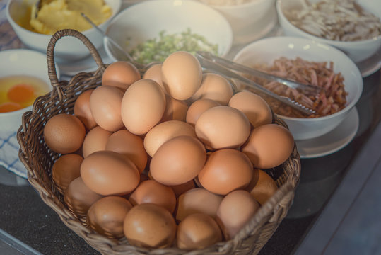 kitchen table with eggs on basket, focus from top view kitchen table.