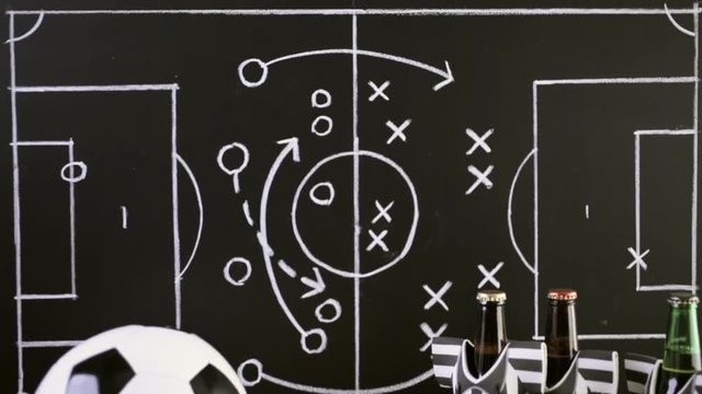 Salty snacks vuvuzela stadium horns on the table to watch football game