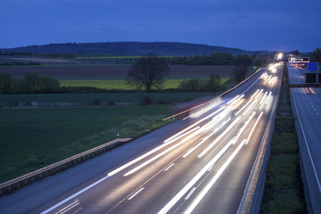some highway traffic in the evening