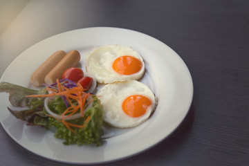 Breakfast - toasts, eggs, bacon,sausages