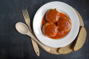 Meatballs in sweet and sour tomato sauce. Top view