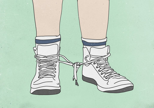 Low section of man with shoelaces tied together against colored background