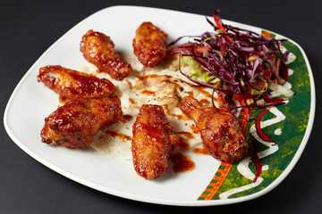 Chicken wings in Mexican style. Mexican food. Mexican cuisine.
