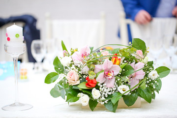 Wedding decoration table with flowers and raindows