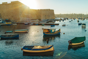 Fototapeta na wymiar The view of the Kalkara bay in the sunset light, Malta