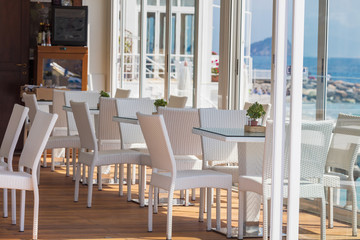 Modern cafe interior with white furniture