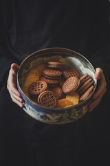 Brown cookies (Chocolate) in the hands