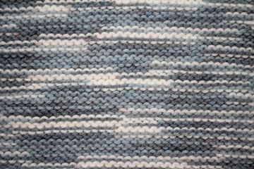 текстура вязаной ткани с абстрактным рисунка в серых тонах     