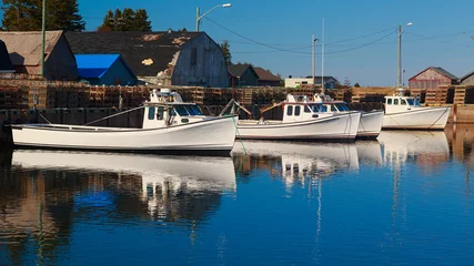 Fotobehang Commercial fishing boats at a wharf in rural Prince Edward Island, Canada. © V. J. Matthew