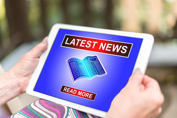 Latest news concept on a tablet