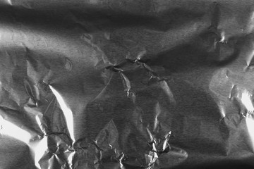 crumpled silver aluminum foil background, abstract texture