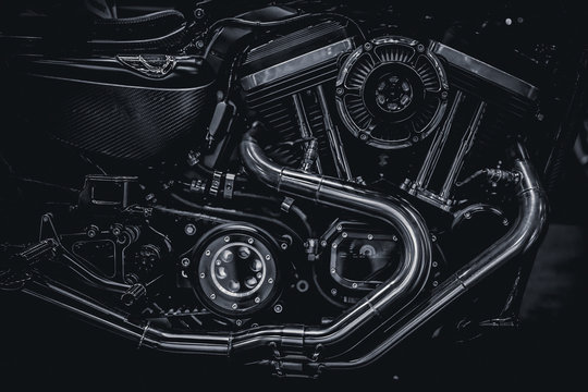 Motorcycle engine engine exhaust pipes art photography in black and white vintage tone © Quality Stock Arts