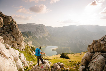 Male Hiker Enjoying The View Over The Beautiful Landscape