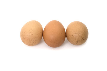 Three eggs isolated on white background