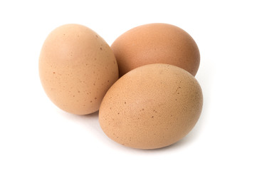 Three eggs isolated on white background