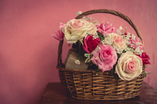 vintage pink rose in the basket with space for text
