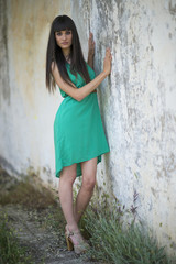 Portrait of a beautiful young woman staring at camera.