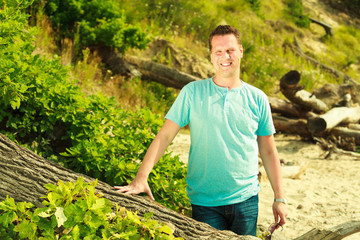 Man spending free time outside, looking at nature