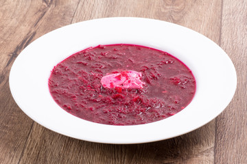 Vegetable soup on a wooden table