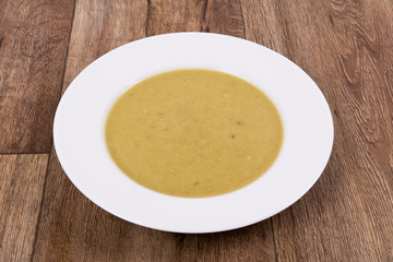 Vegetable soup on a wooden table