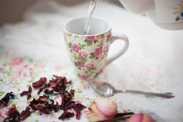 mug with red tea is on the table
