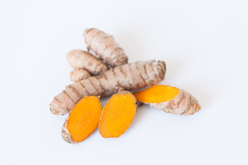 Turmeric roots isolated on white background