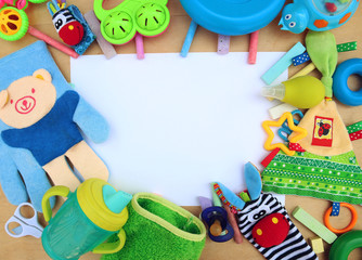Children's toys and accessories for boy on a wooden background