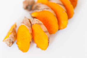 Turmeric roots isolated on white background