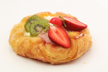 danish pastry with strawberry, kiwi and tangarine