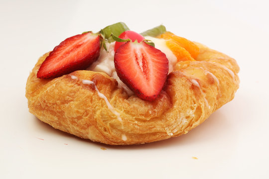 danish pastry with strawberry, kiwi and tangarine