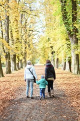 Fototapeta premium grandmom, mom and son in the park