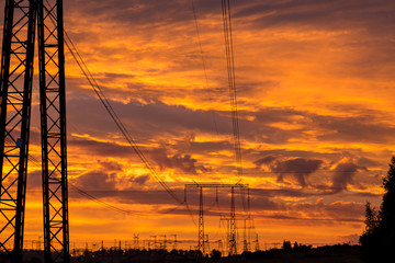 Power line support against a fantastic sky background