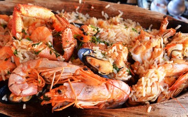 A huge platter of seafood. Very tasty food on a light background.