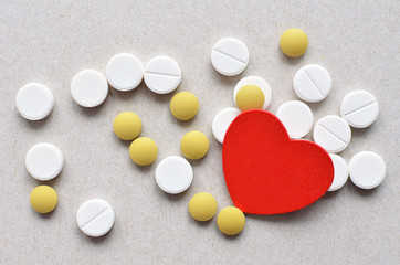 colored tablets with red heart