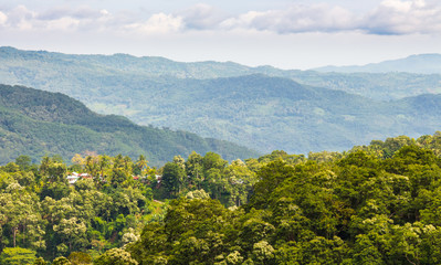 View of the green hills and mountain village