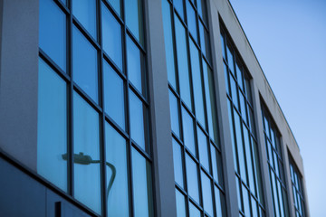 Office buildings in cityscape with a sky blue