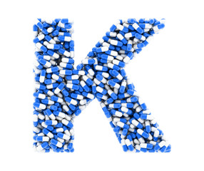 Letter K, alphabet of medicine pills. 3D render.
