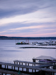 sunset at a marina, docks and boats; copy space