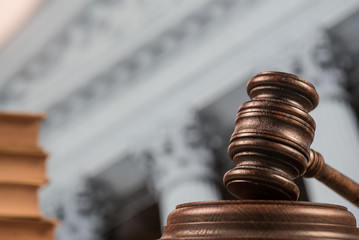 law concept on wooden desk, mallet of the judge, justice scale,, books, 