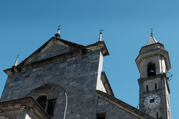 Fototapeta na wymiar Blue sky and church in old Town in Northern Italy