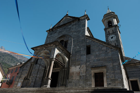 Church with blue sky in old Town in Northern Italy (Varzo)