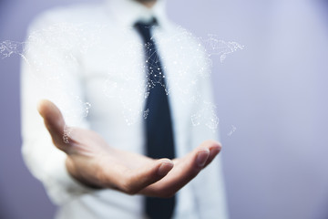 Businessman pointing on the touch screen with world map
