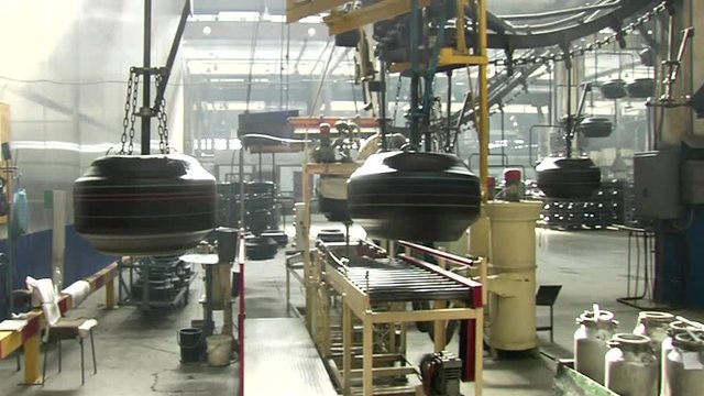 Conveyor workshop at the car tires plant royalty free stock video 