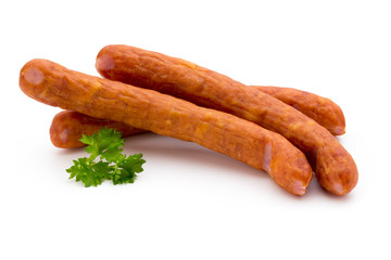 Stack of smoked sausages isolated on a white background.