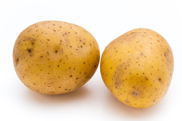 Raw potato isolated on white background.